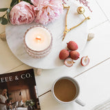 Lychee Peony Blossom vintage glass candle lifestyle