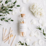 Mini Apothecary Matches flat lay with eucalyptus and white roses