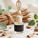 Sandalwood Smoke car diffuser against a sandalwood incense bundle