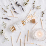 Mini Apothecary Matches flat lay with lavender and lit candle