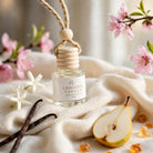 Cashmere Vanilla car diffuser styled on rich cashmere with vanilla, pear, peach blossom and jasmine