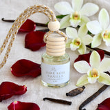 Dark Rose Vanilla car diffuser with dark rose petals, vanilla orchid blossoms and vanilla beans