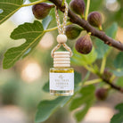 Fig Tree Freesia car diffuser hanging from a fig tree branch