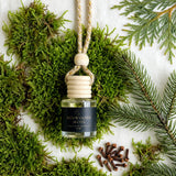 Redwoods Moss car diffuser flat lay with lush moss, pine, cedar and cloves