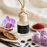 Saffron Tobacco car diffuser styled with saffron, peonies, orchid, tobacco, vanilla and tonka beans
