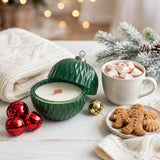 Christmas ornament candle with hot cocoa and gingerbread cookies