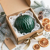 Christmas ornament candle in kraft gift box with gold ribbon