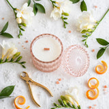 Overhead view of Sea Salt Orchid candle with white wax and wooden wick