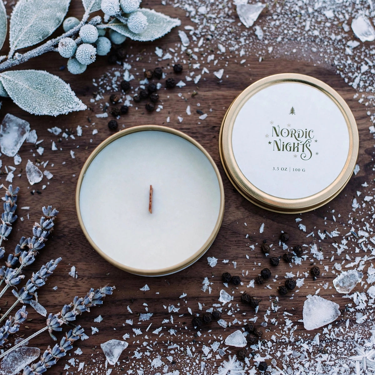 Open unlit Nordic Nights travel tin candle showing wooden wick
