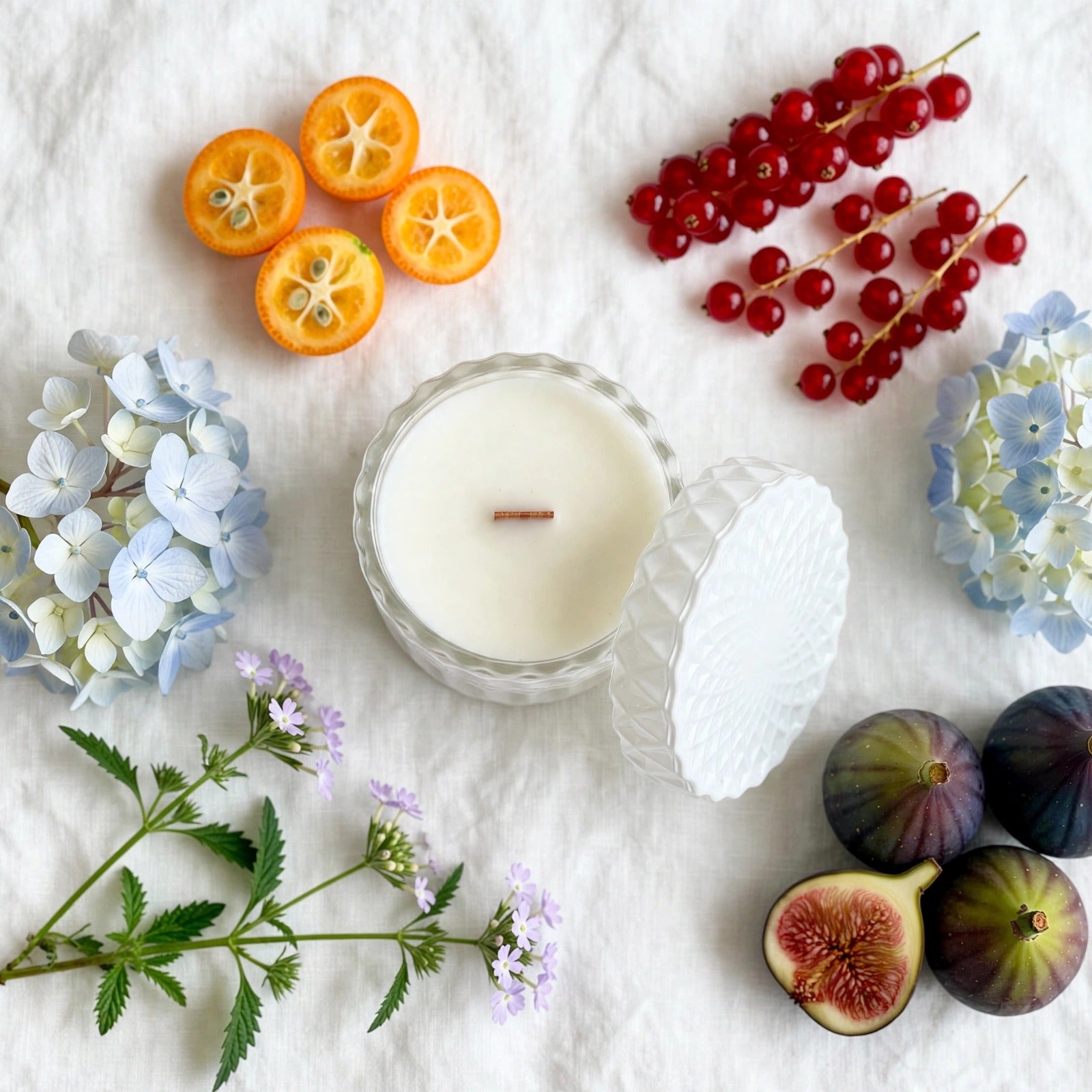Red Currant Kumquat vintage glass candle flat lay