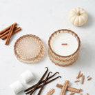 Vanilla Pumpkin Santal vintage glass candle flat lay with cinnamon, marshmallows, vanilla and sandalwood