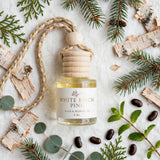 White Birch Pine flat lay with scent notes